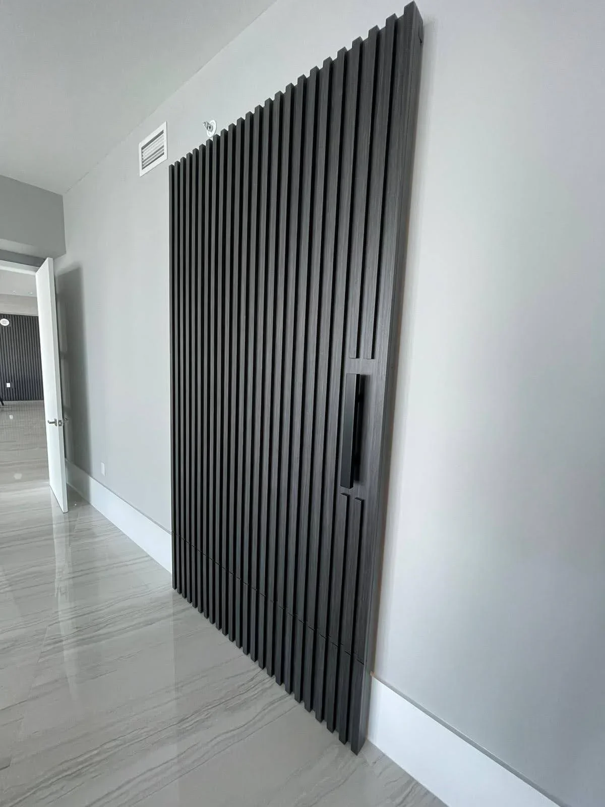 Vertical slat wall, residence
